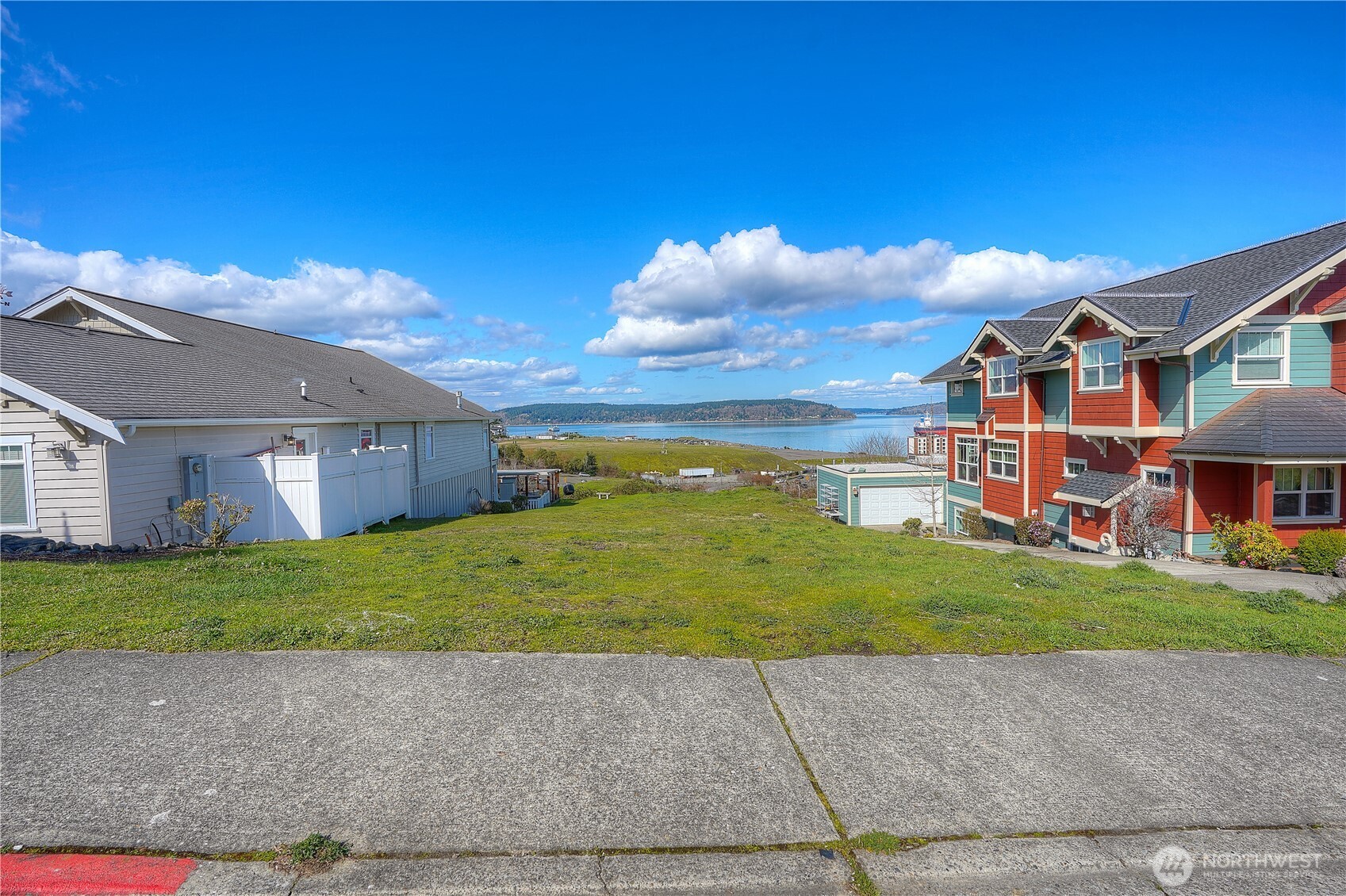 5313 North Commercial Street Ruston, WA 98407 - Photo 25 of 35 a front view of a house with a yard