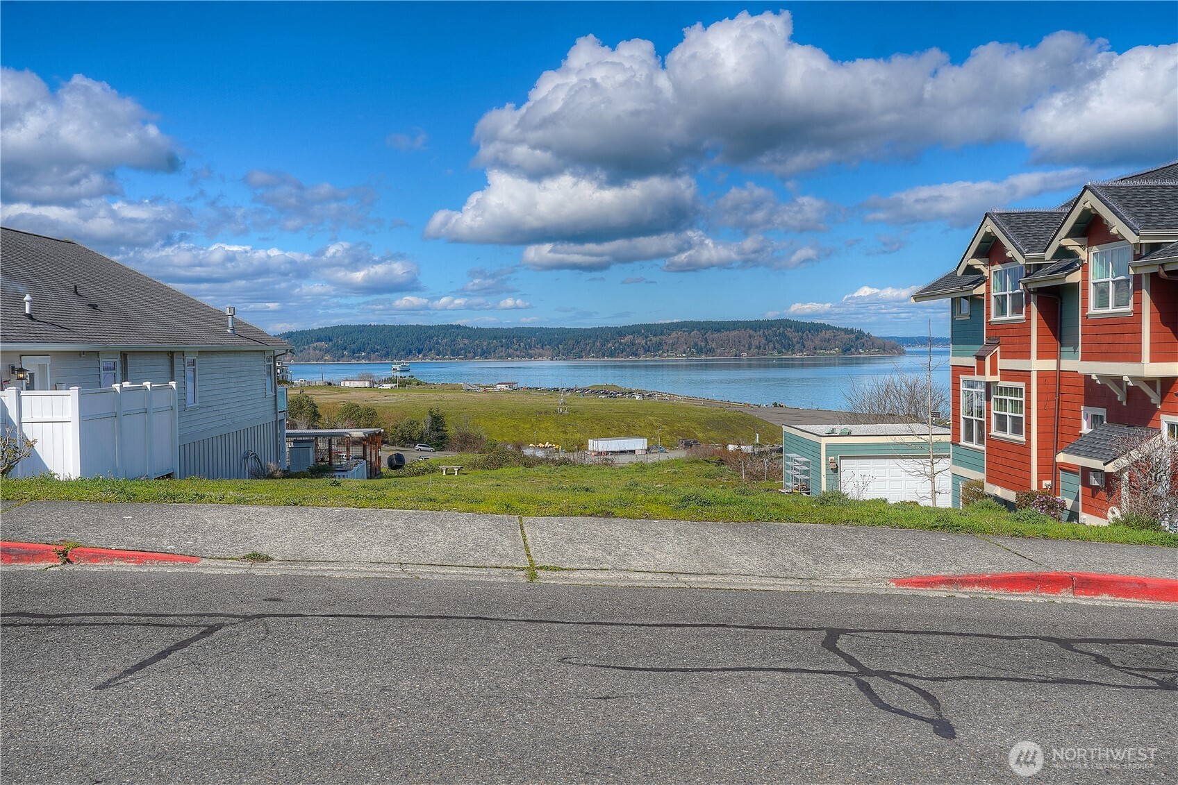 5313 North Commercial Street Ruston, WA 98407 - Photo 27 of 35 a view of a houses with a yard