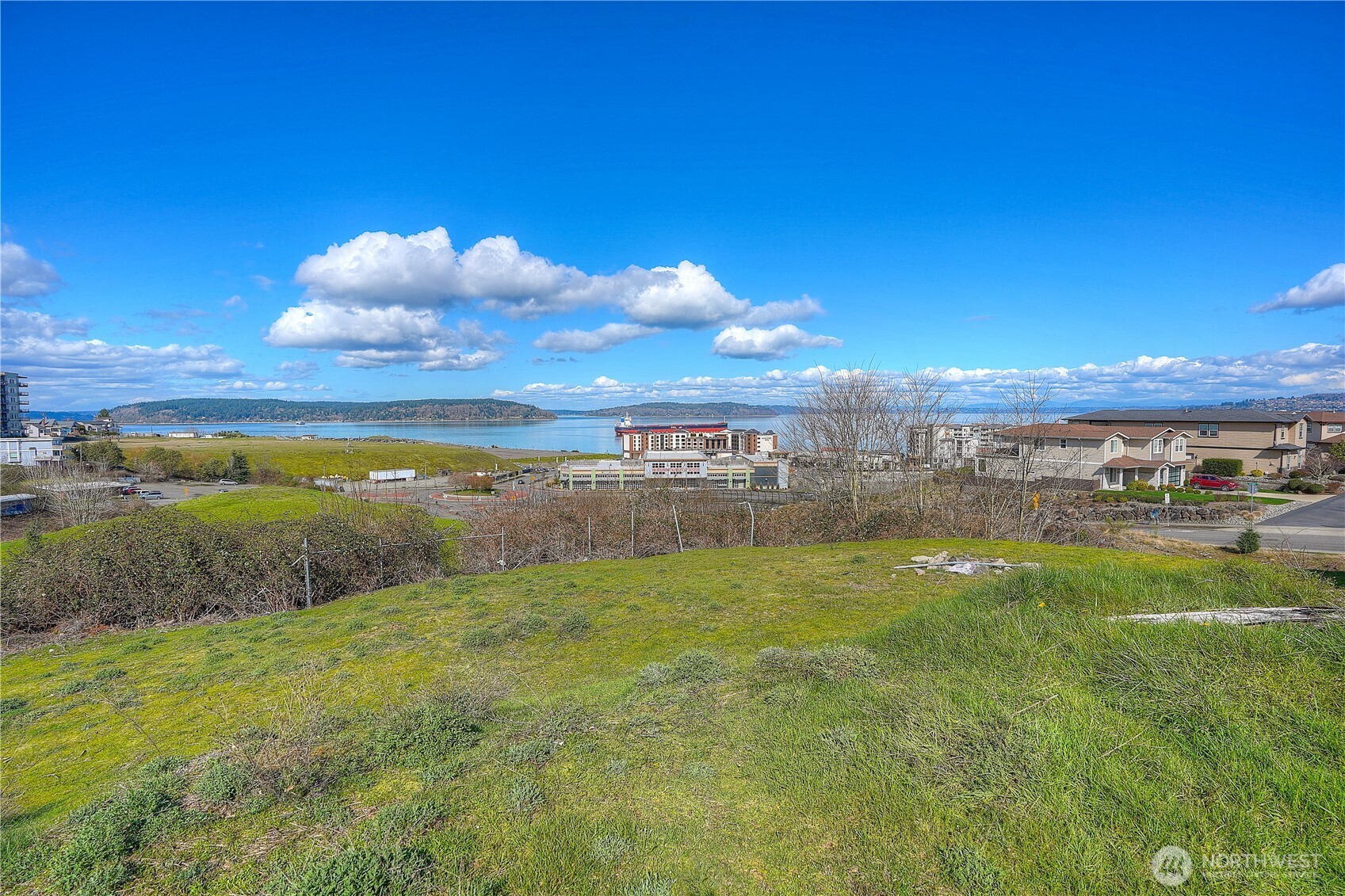 5313 North Commercial Street Ruston, WA 98407 - Photo 33 of 35 a view of an ocean and a yard