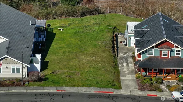 a view of multiple houses with outdoor space