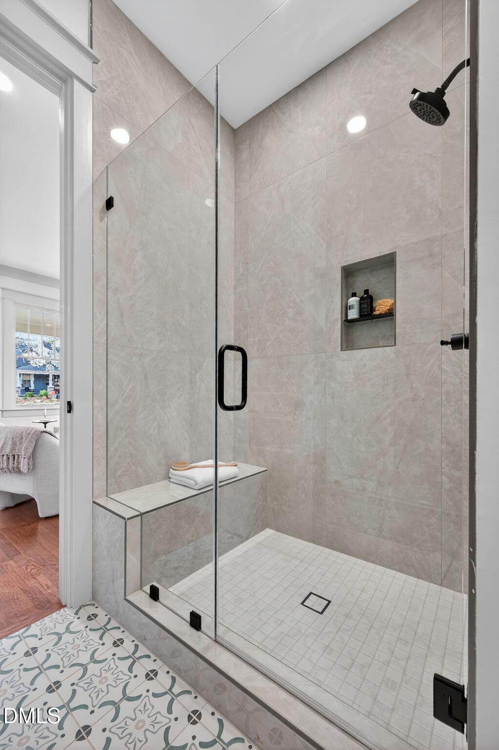 504 Tilden Street Raleigh, NC 27605 - Photo 14 of 58 a bathroom with a shower and a sink