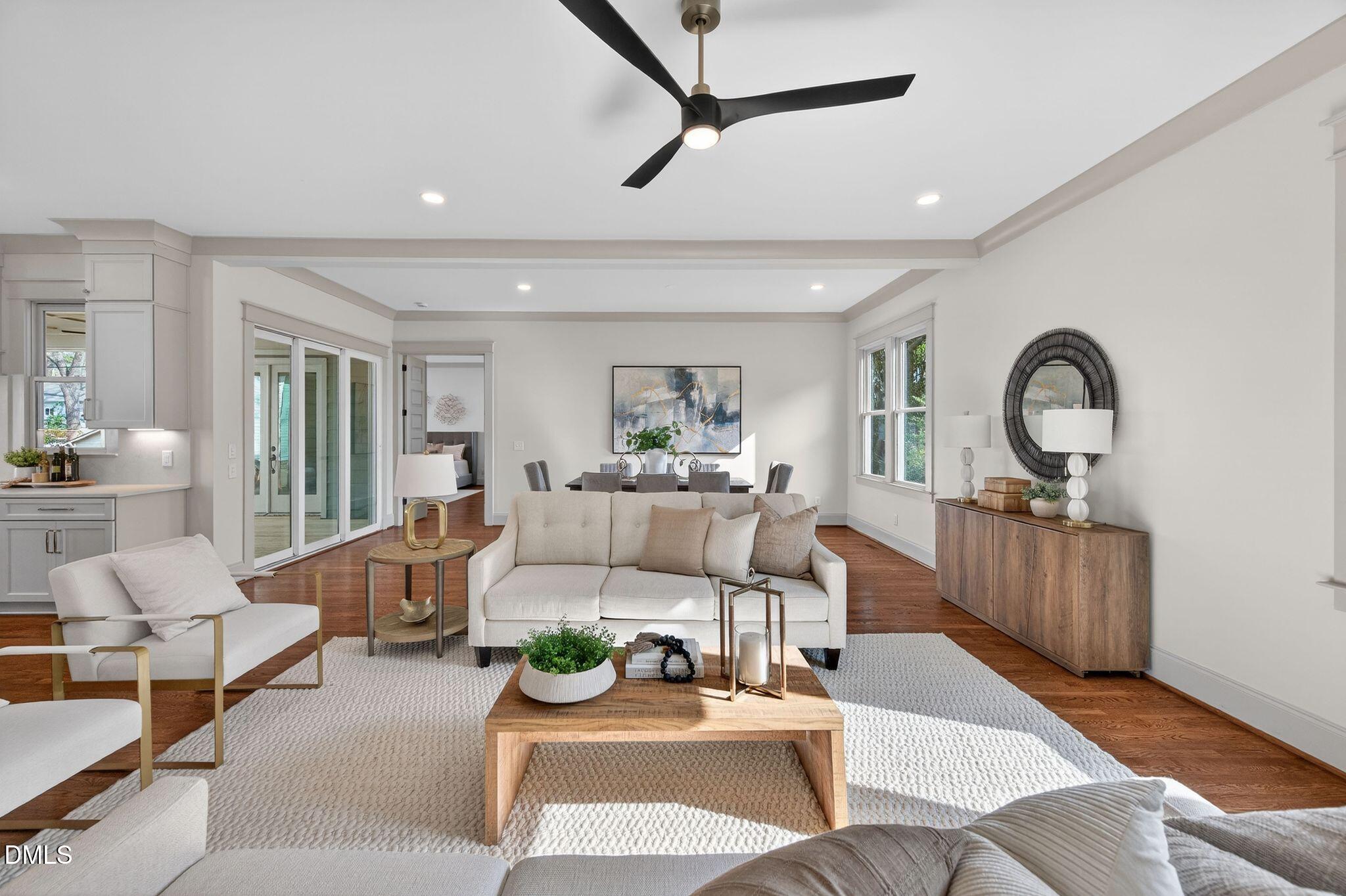 504 Tilden Street Raleigh, NC 27605 - Photo 16 of 58 a living room with furniture and a wooden floor
