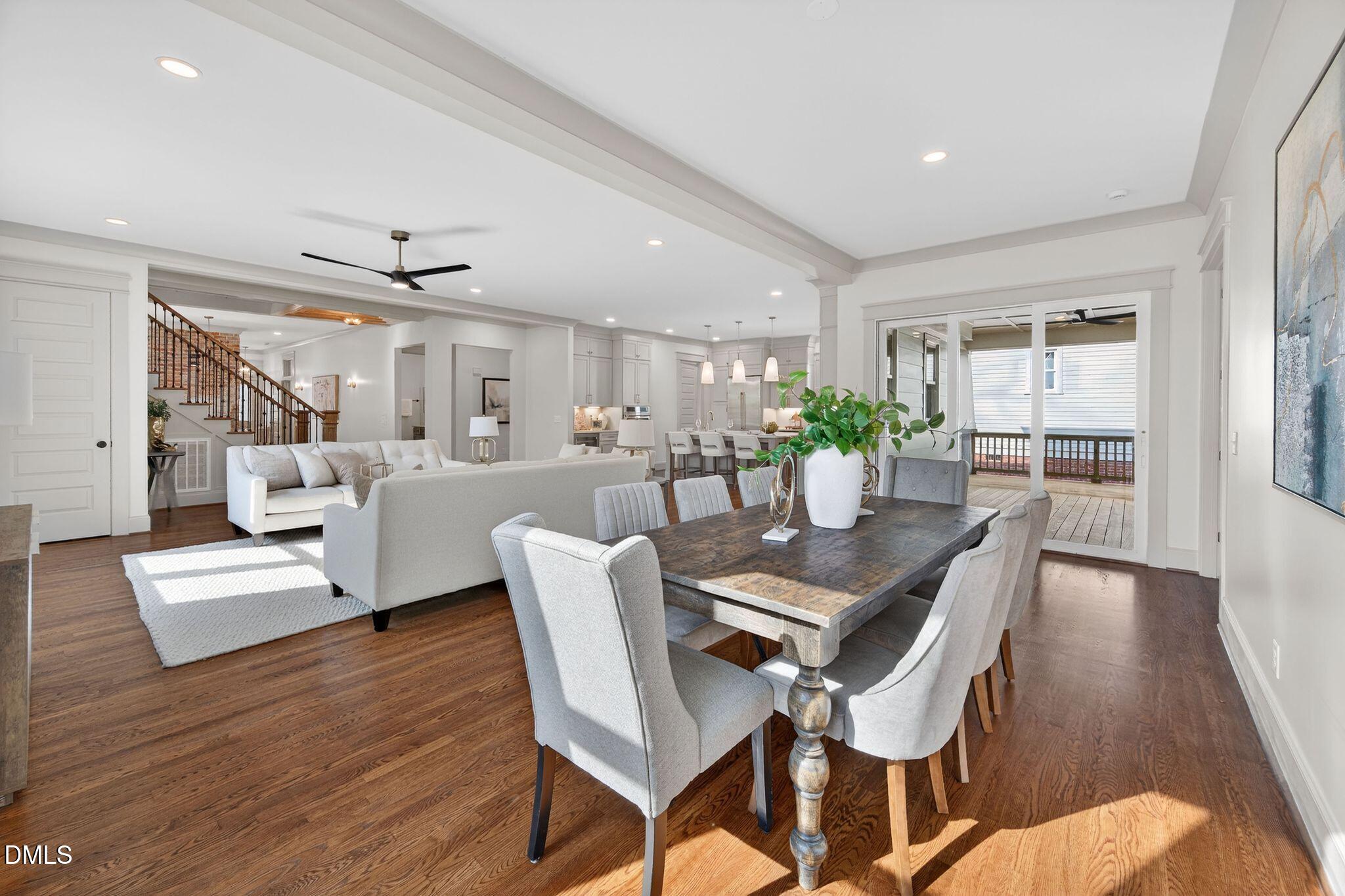 504 Tilden Street Raleigh, NC 27605 - Photo 22 of 58 a view of a dining room with furniture and wooden floor