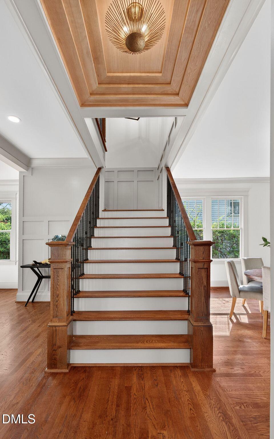 504 Tilden Street Raleigh, NC 27605 - Photo 32 of 58 a view of entryway livingroom and hall with wooden floor