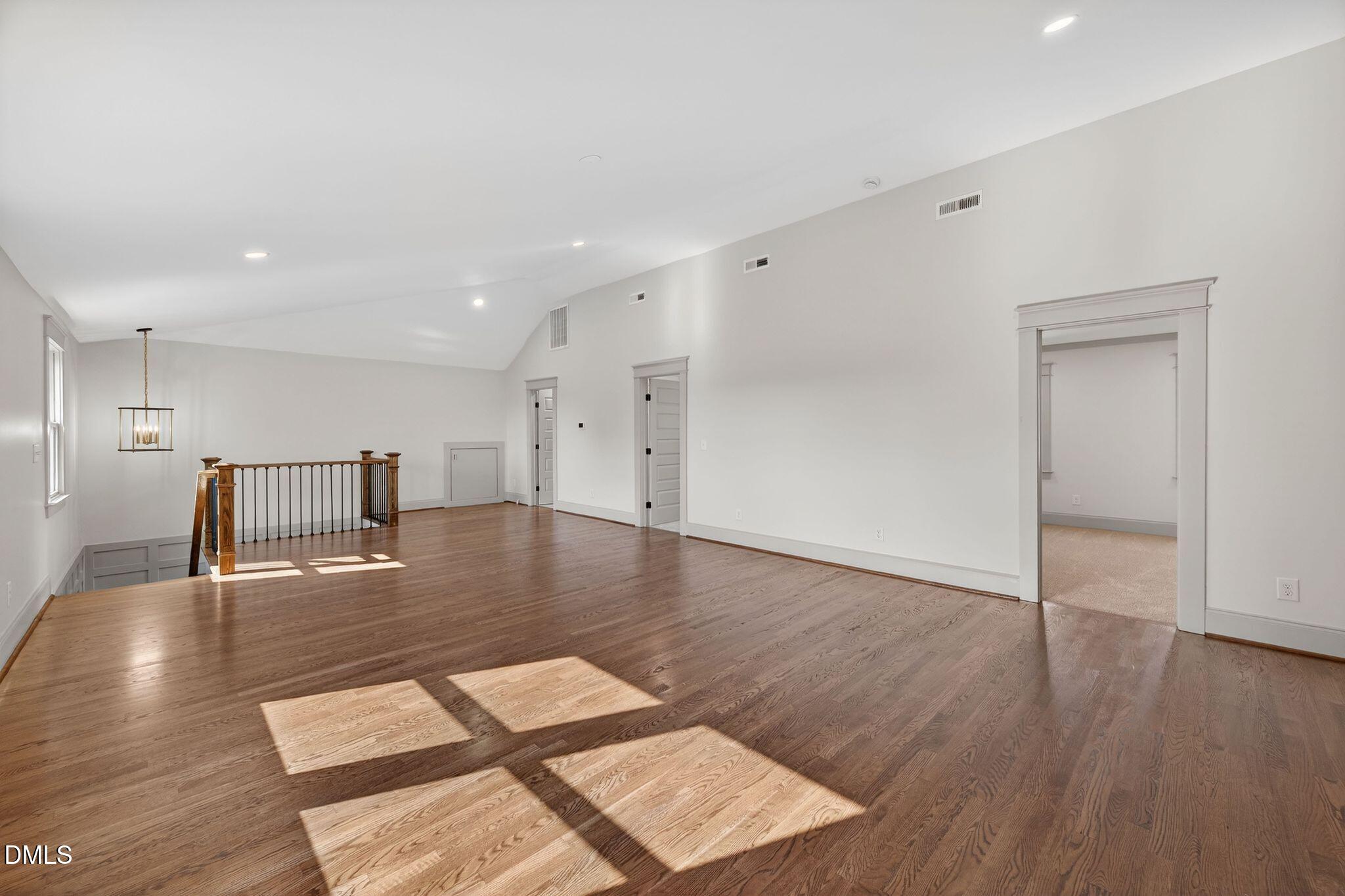 504 Tilden Street Raleigh, NC 27605 - Photo 34 of 58 a view of a room with wooden floor