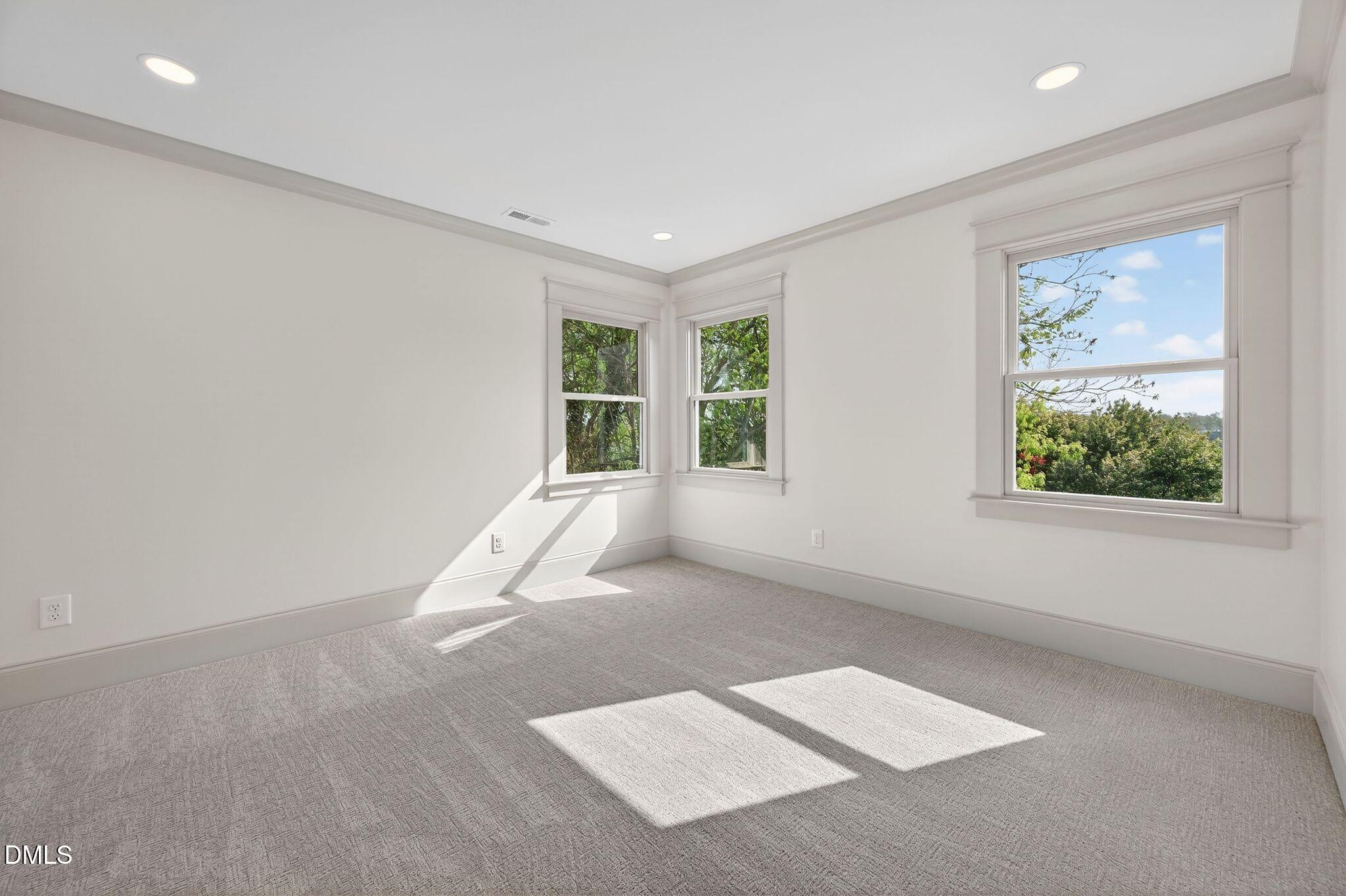 504 Tilden Street Raleigh, NC 27605 - Photo 39 of 58 an empty room with windows