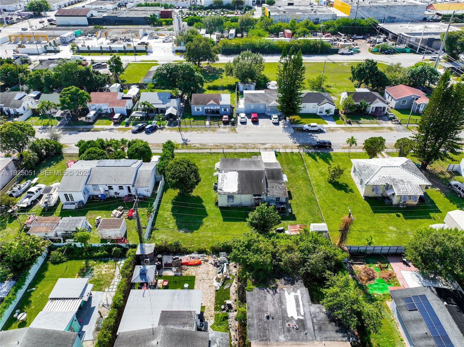 761 Northwest 74th Street Miami, FL 33150 - Photo 11 of 23 an aerial view of multiple house