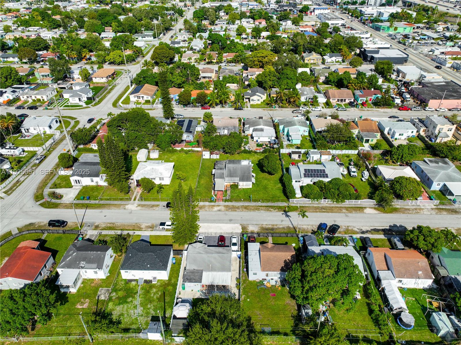 761 Northwest 74th Street Miami, FL 33150 - Photo 12 of 23 an aerial view of residential houses with outdoor space and street view