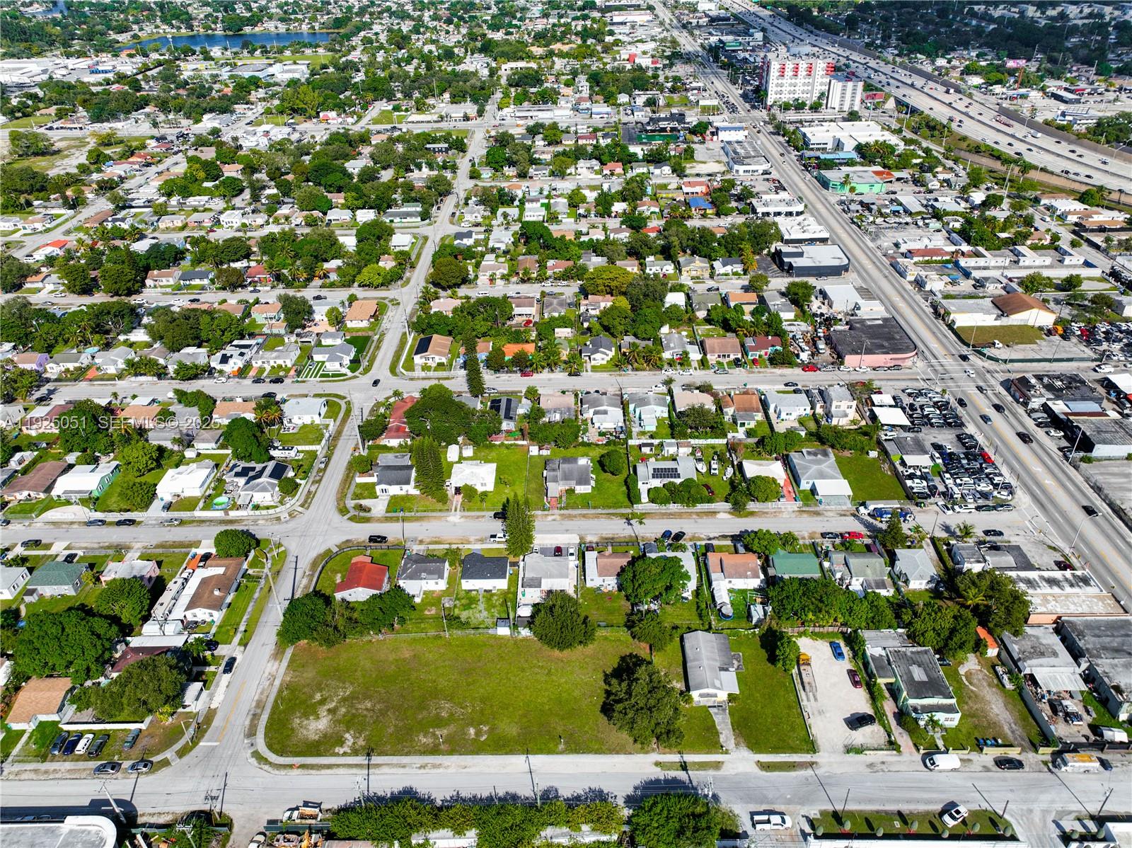 761 Northwest 74th Street Miami, FL 33150 - Photo 13 of 23 an aerial view of residential houses with outdoor space
