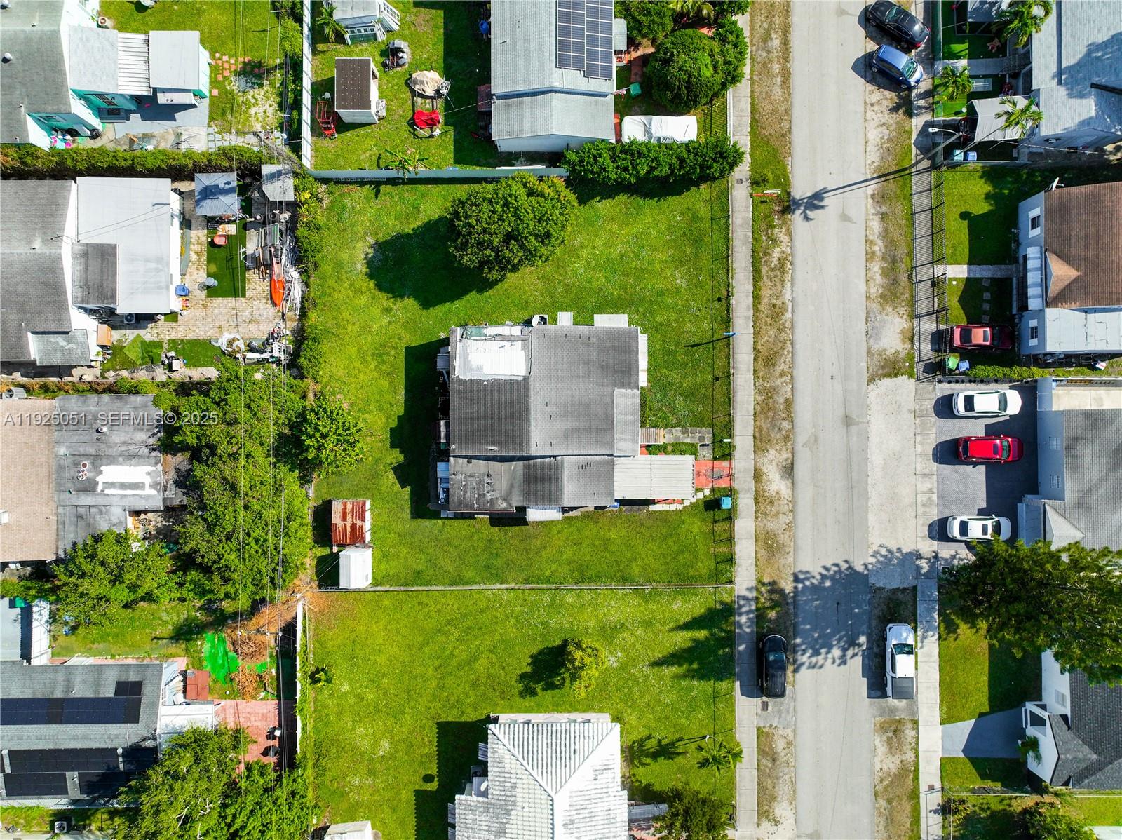 761 Northwest 74th Street Miami, FL 33150 - Photo 7 of 23 an aerial view of multiple house