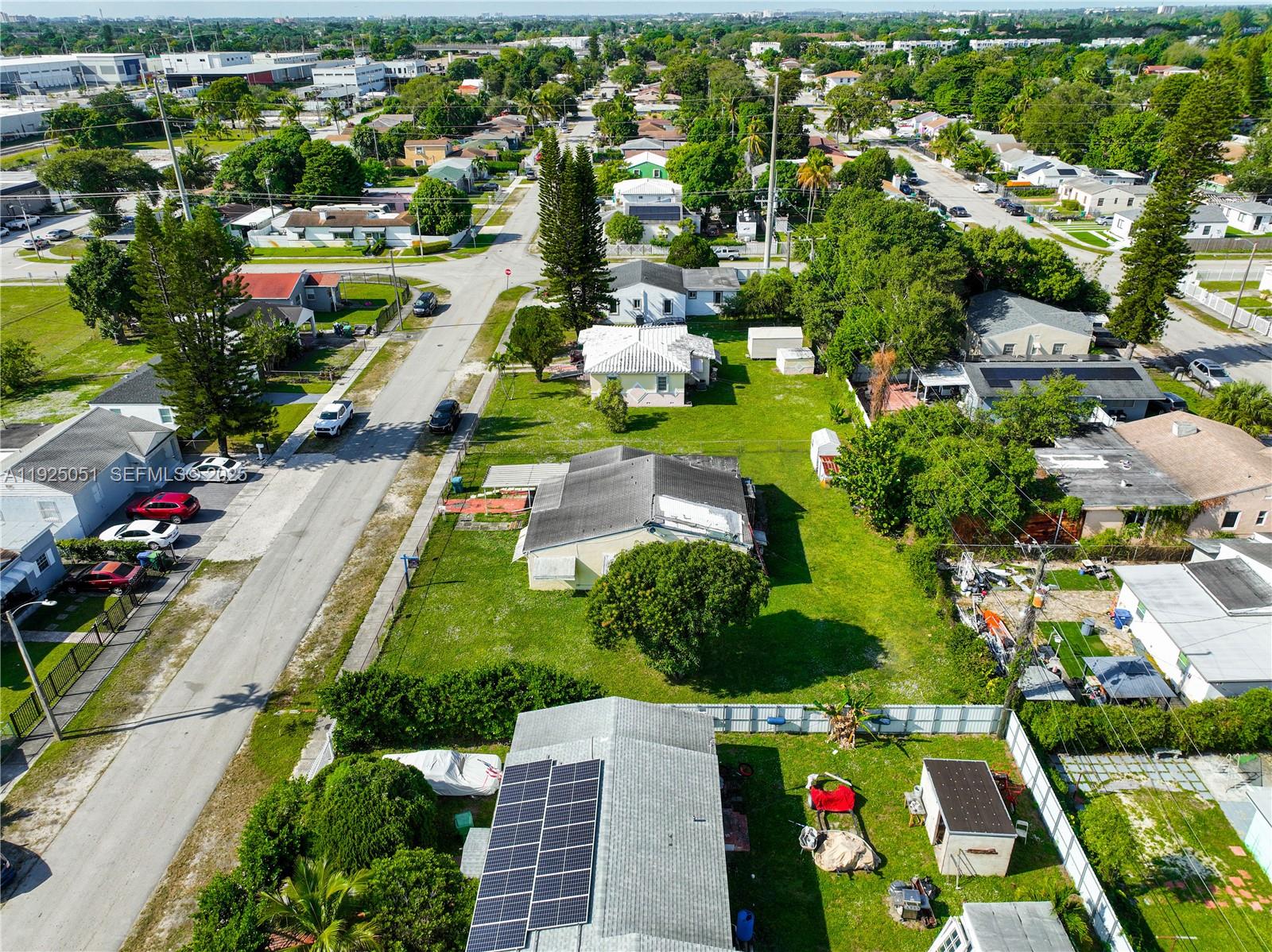 761 Northwest 74th Street Miami, FL 33150 - Photo 9 of 23 an aerial view of multiple house