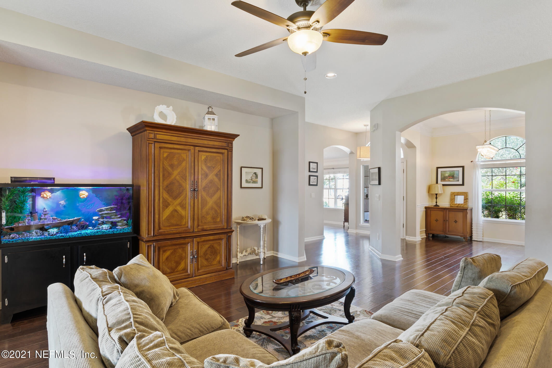 768 West Devonhurst Lane Ponte Vedra, FL 32081 - Photo 11 of 49 a living room with furniture and a flat screen tv