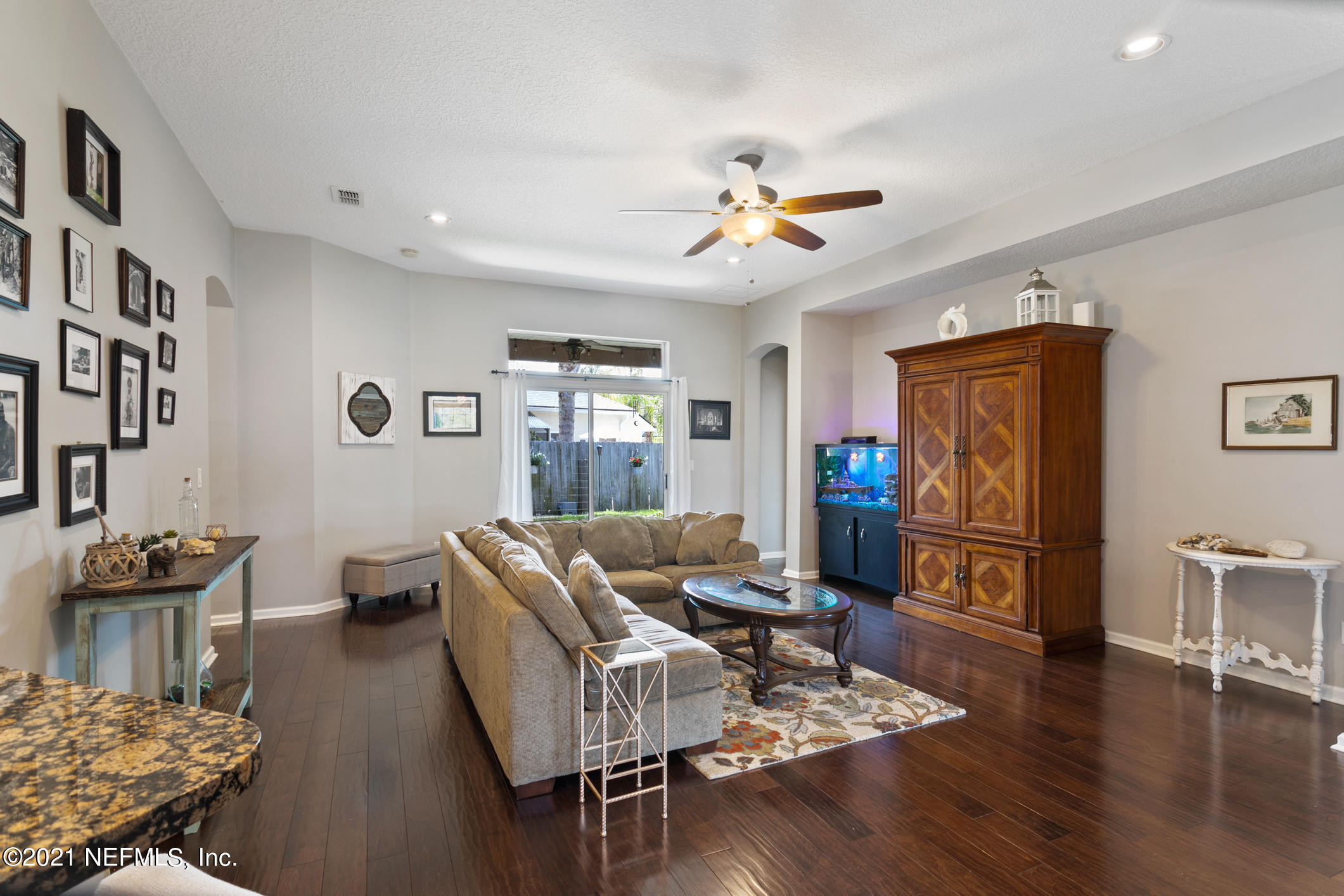 768 West Devonhurst Lane Ponte Vedra, FL 32081 - Photo 13 of 49 a living room with furniture and a wooden floor