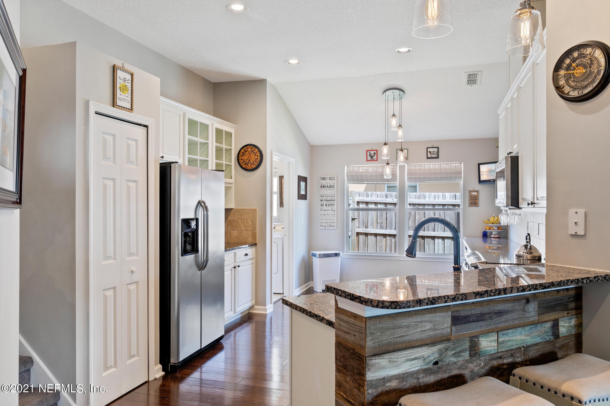 768 West Devonhurst Lane Ponte Vedra, FL 32081 - Photo 20 of 49 a view of a kitchen with stainless steel appliances granite countertop a stove and a refrigerator