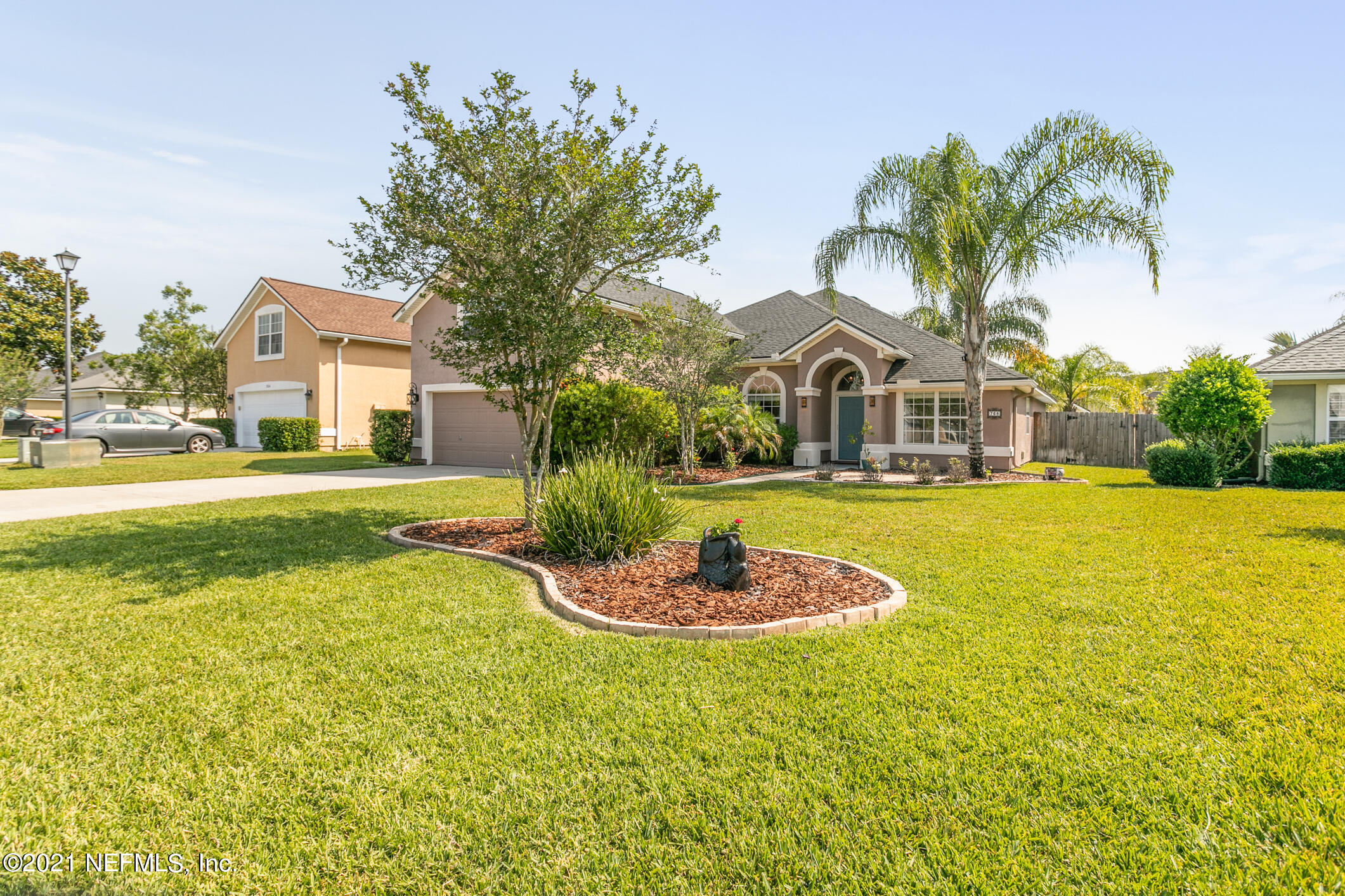 768 West Devonhurst Lane Ponte Vedra, FL 32081 - Photo 2 of 49 a front view of a house with a yard