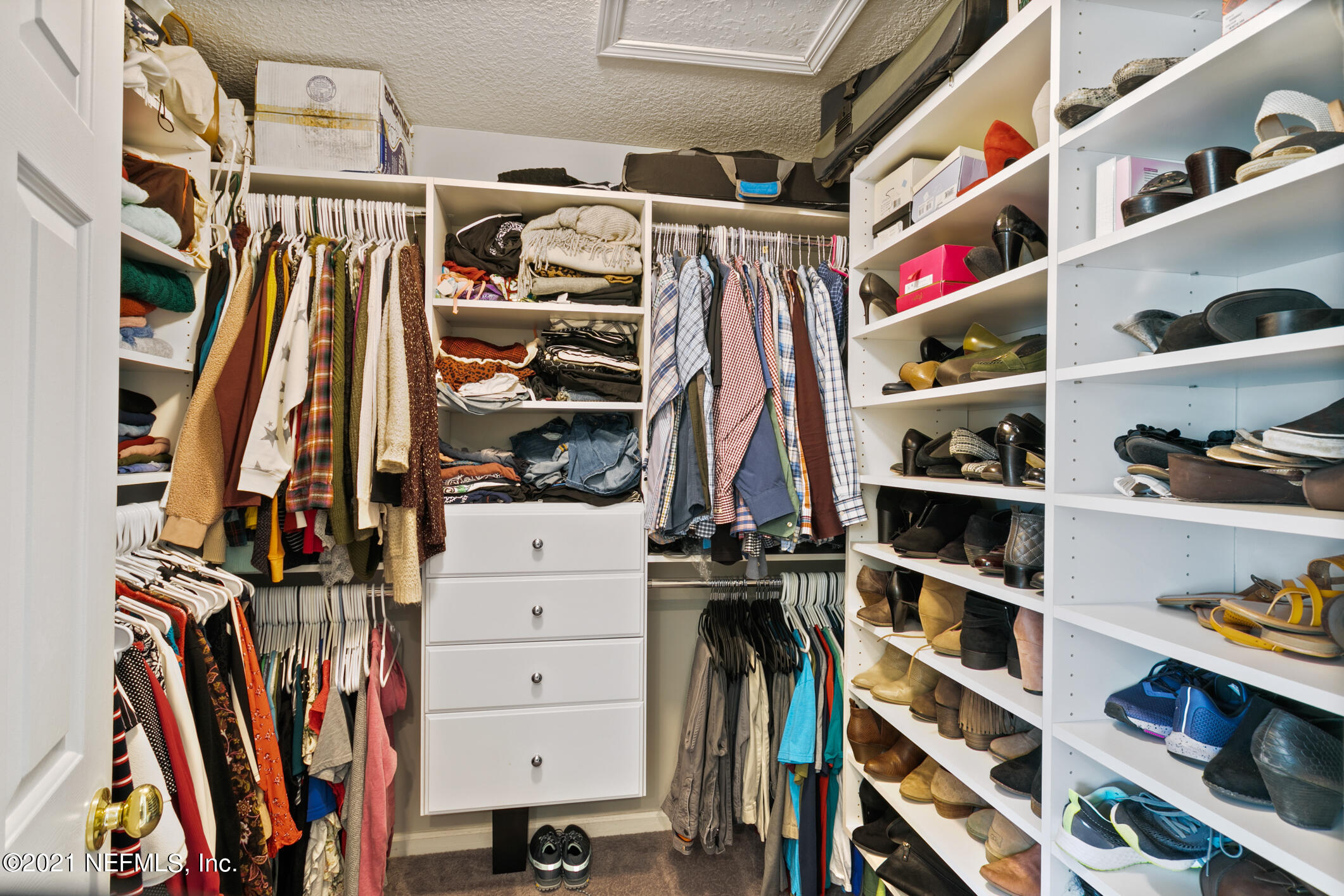 768 West Devonhurst Lane Ponte Vedra, FL 32081 - Photo 28 of 49 a view of walk in closet with clothes and shoes