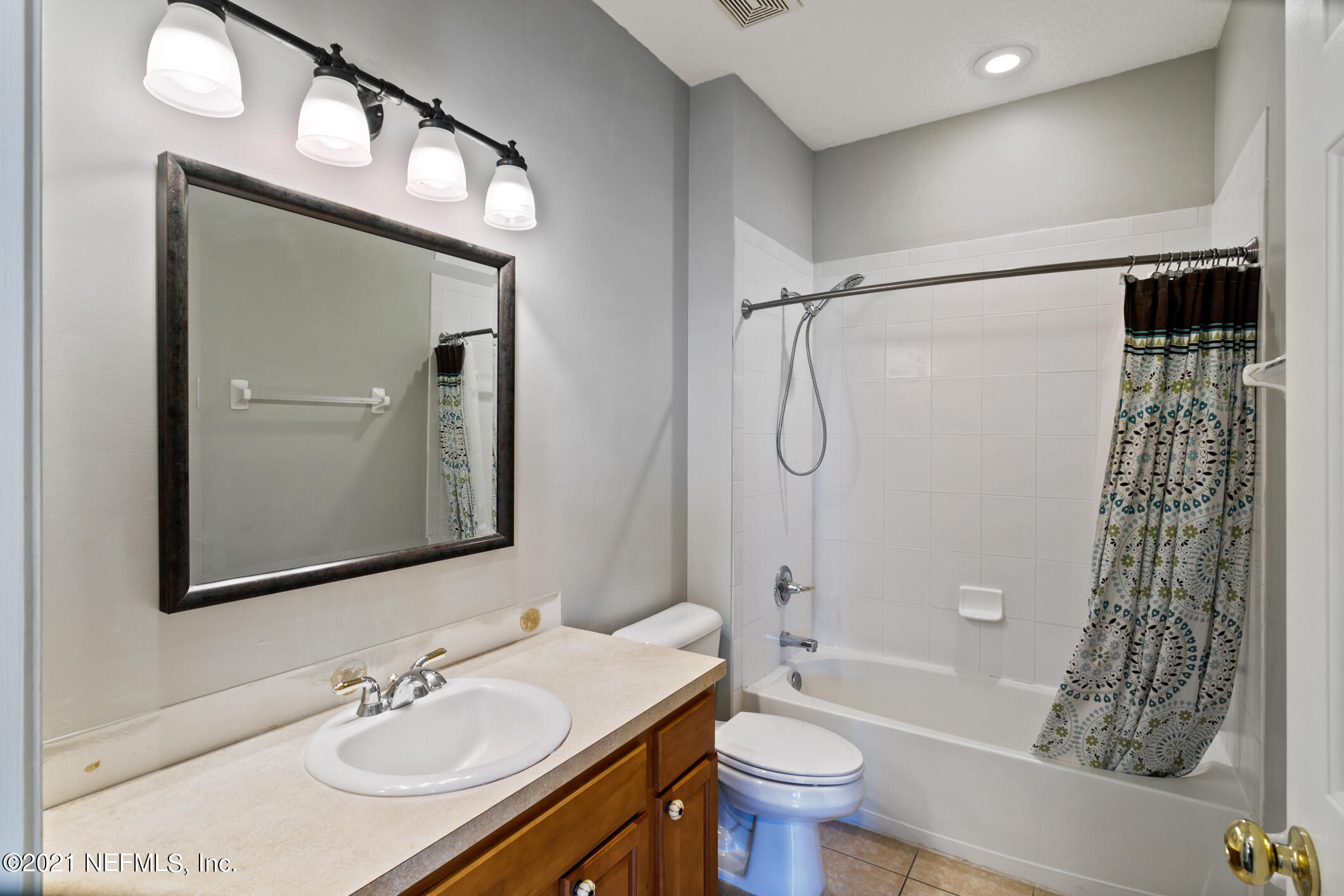 768 West Devonhurst Lane Ponte Vedra, FL 32081 - Photo 29 of 49 a bathroom with a bathtub shower sink vanity and toilet