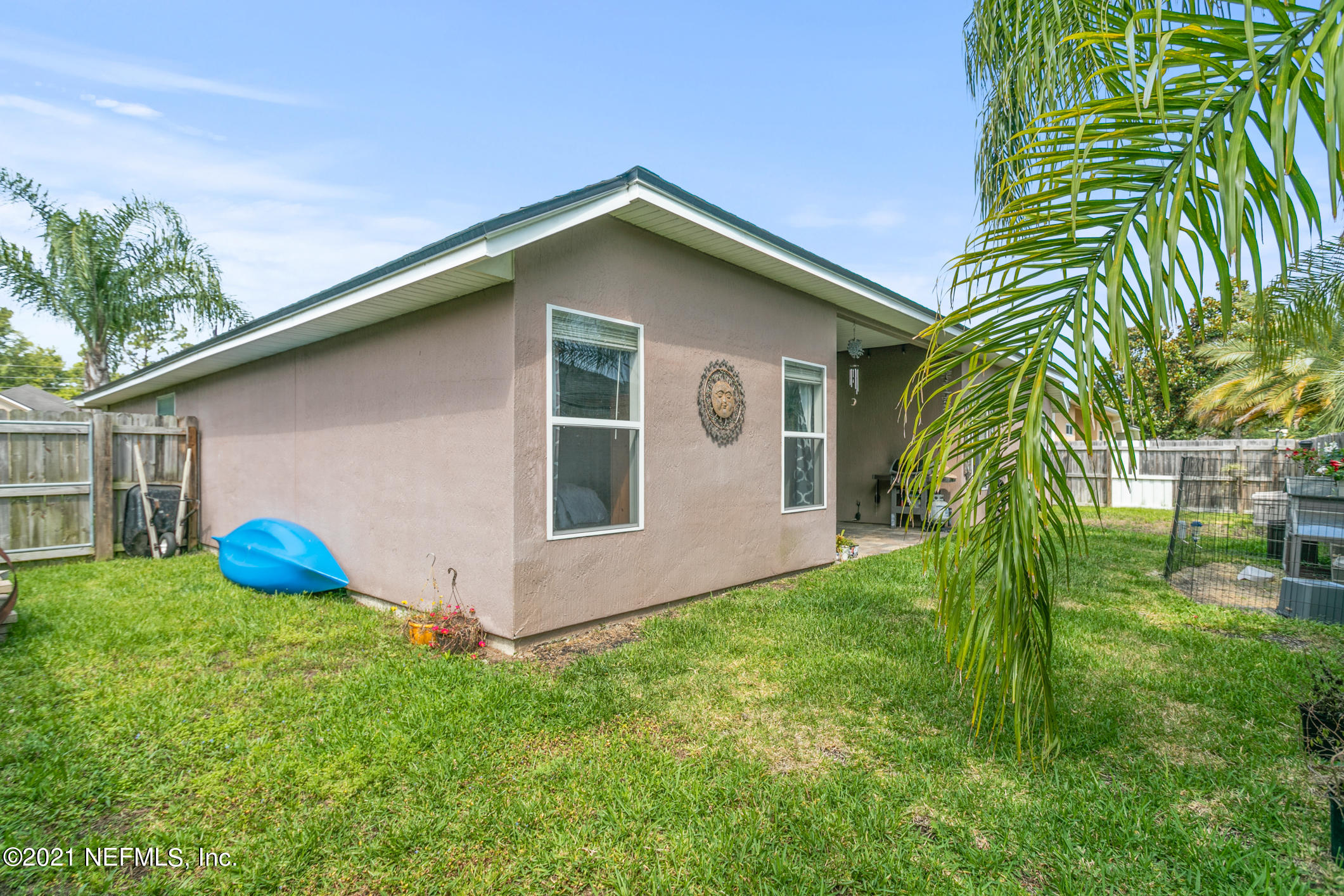 768 West Devonhurst Lane Ponte Vedra, FL 32081 - Photo 3 of 49 a front view of house with yard and outdoor seating