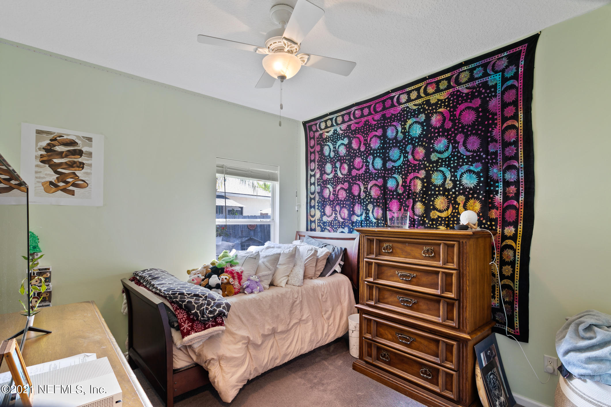 768 West Devonhurst Lane Ponte Vedra, FL 32081 - Photo 31 of 49 a living room with furniture and a flat screen tv