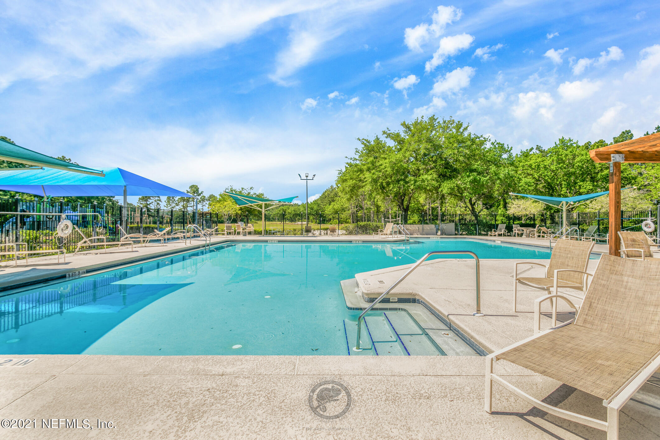 768 West Devonhurst Lane Ponte Vedra, FL 32081 - Photo 43 of 49 a view of swimming pool with seating space and yard in the back