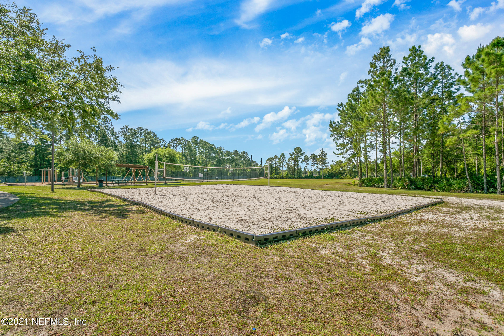 768 West Devonhurst Lane Ponte Vedra, FL 32081 - Photo 46 of 49 a view of a swimming pool and a yard