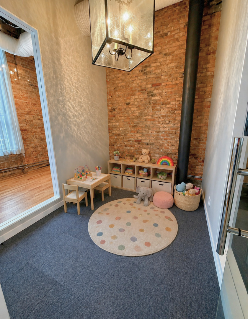 1327 West Washington Boulevard, Unit 106 Chicago, IL 60607 - Photo 13 of 23 a view of a room with table and chairs