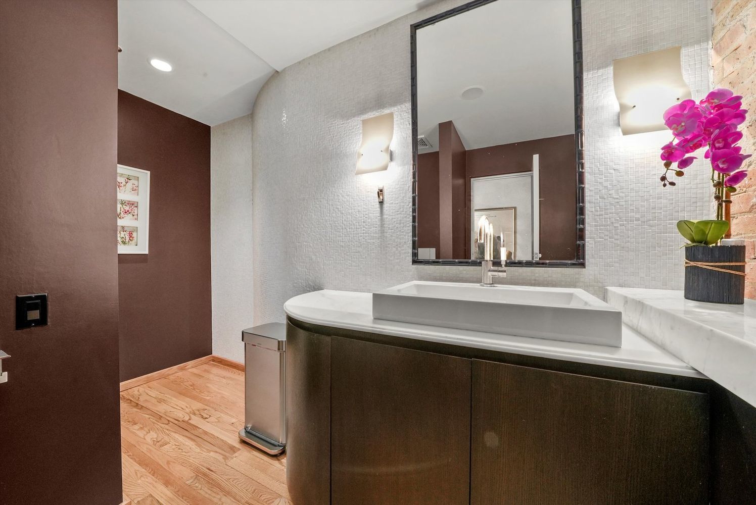 1327 West Washington Boulevard, Unit 106 Chicago, IL 60607 - Photo 17 of 23 a bathroom with a sink and a mirror