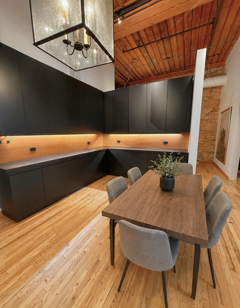 1327 West Washington Boulevard, Unit 106 Chicago, IL 60607 - Photo 8 of 23 a table with chairs and wooden floor
