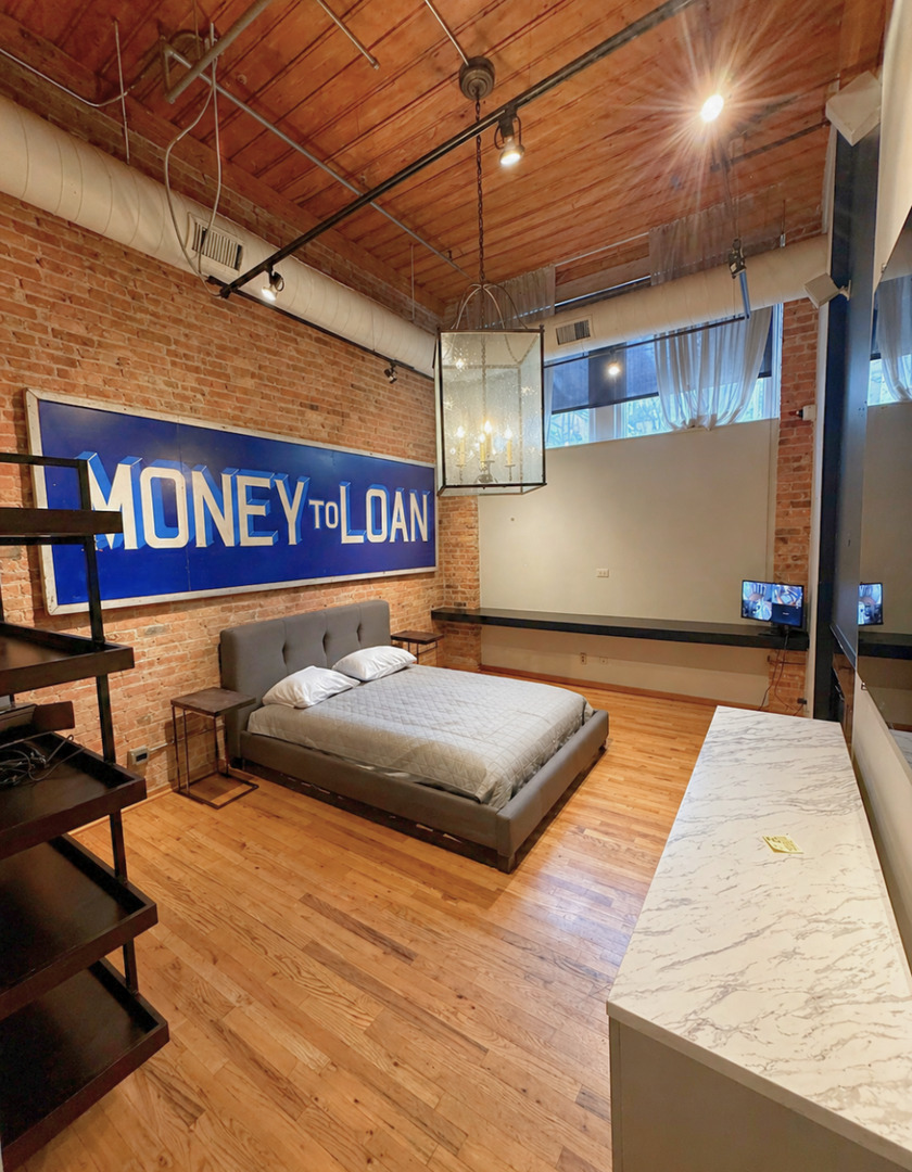 1327 West Washington Boulevard, Unit 106 Chicago, IL 60607 - Photo 10 of 23 a view of a room with gym equipment