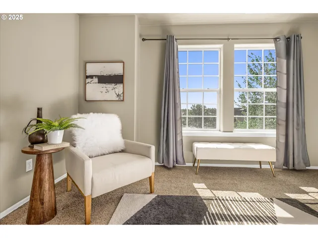 a living room with furniture and a bathtub