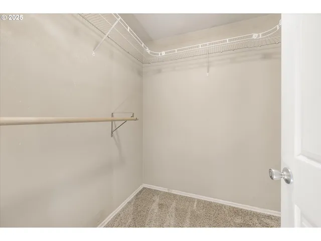 a view of small space with racks on the wall