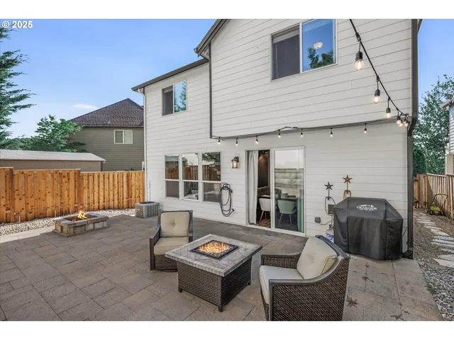 a backyard of a house with seating space