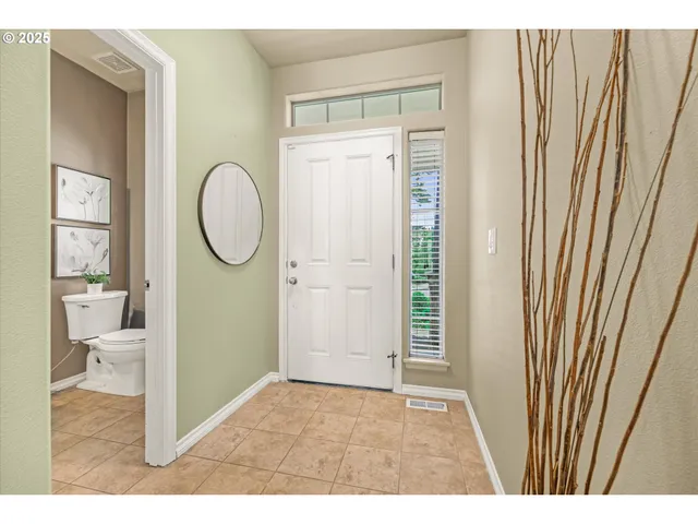 a view of a room that has a window in it