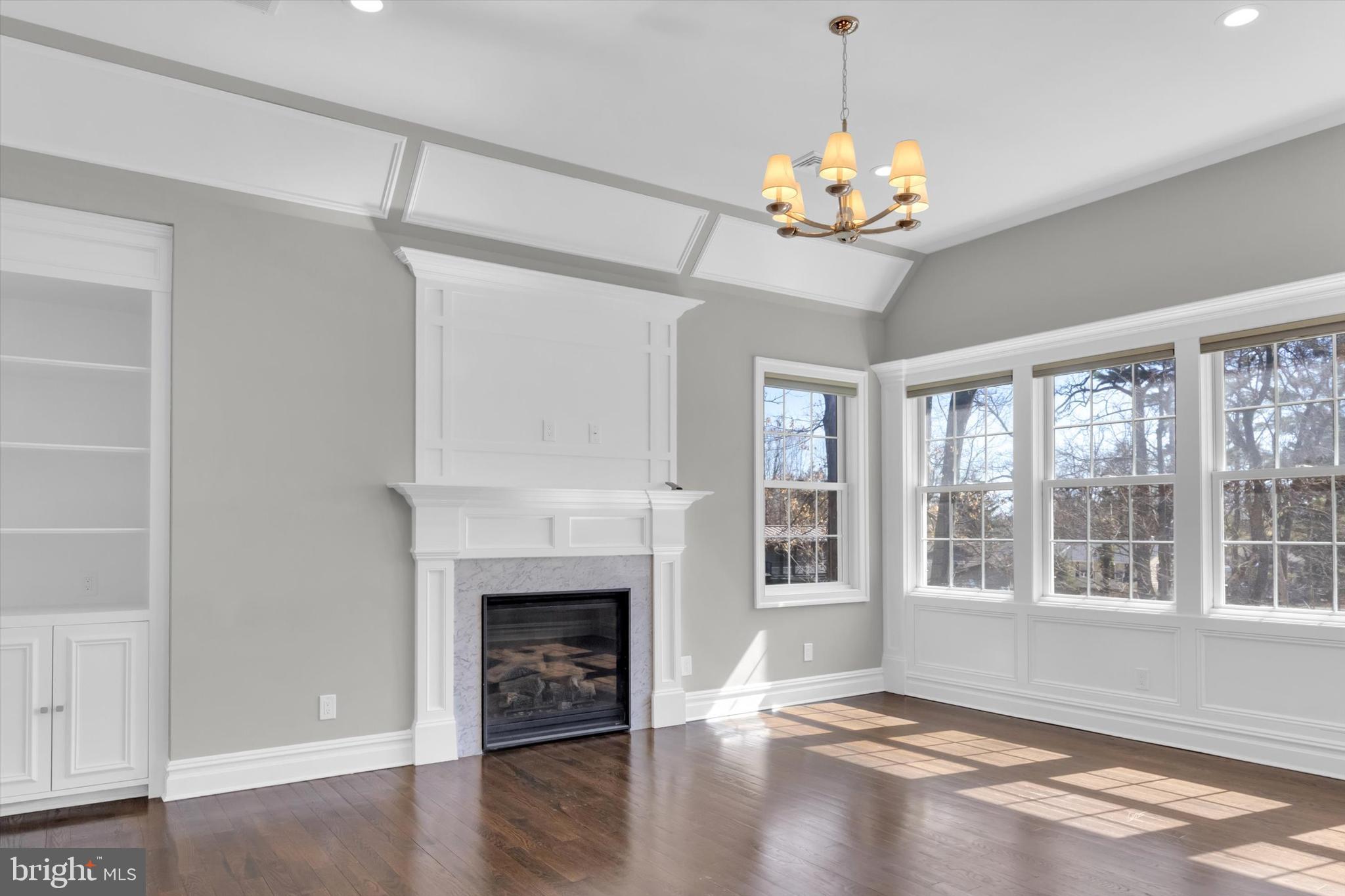 151 Sycamore Road Princeton, NJ 08540 - Photo 24 of 46 a view of an empty room with a window and fireplace