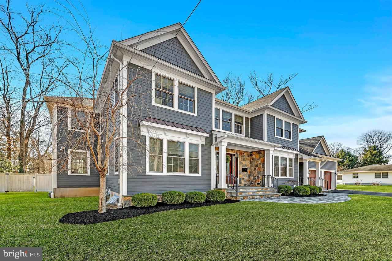 151 Sycamore Road Princeton, NJ 08540 - Photo 3 of 46 a front view of a house with a yard