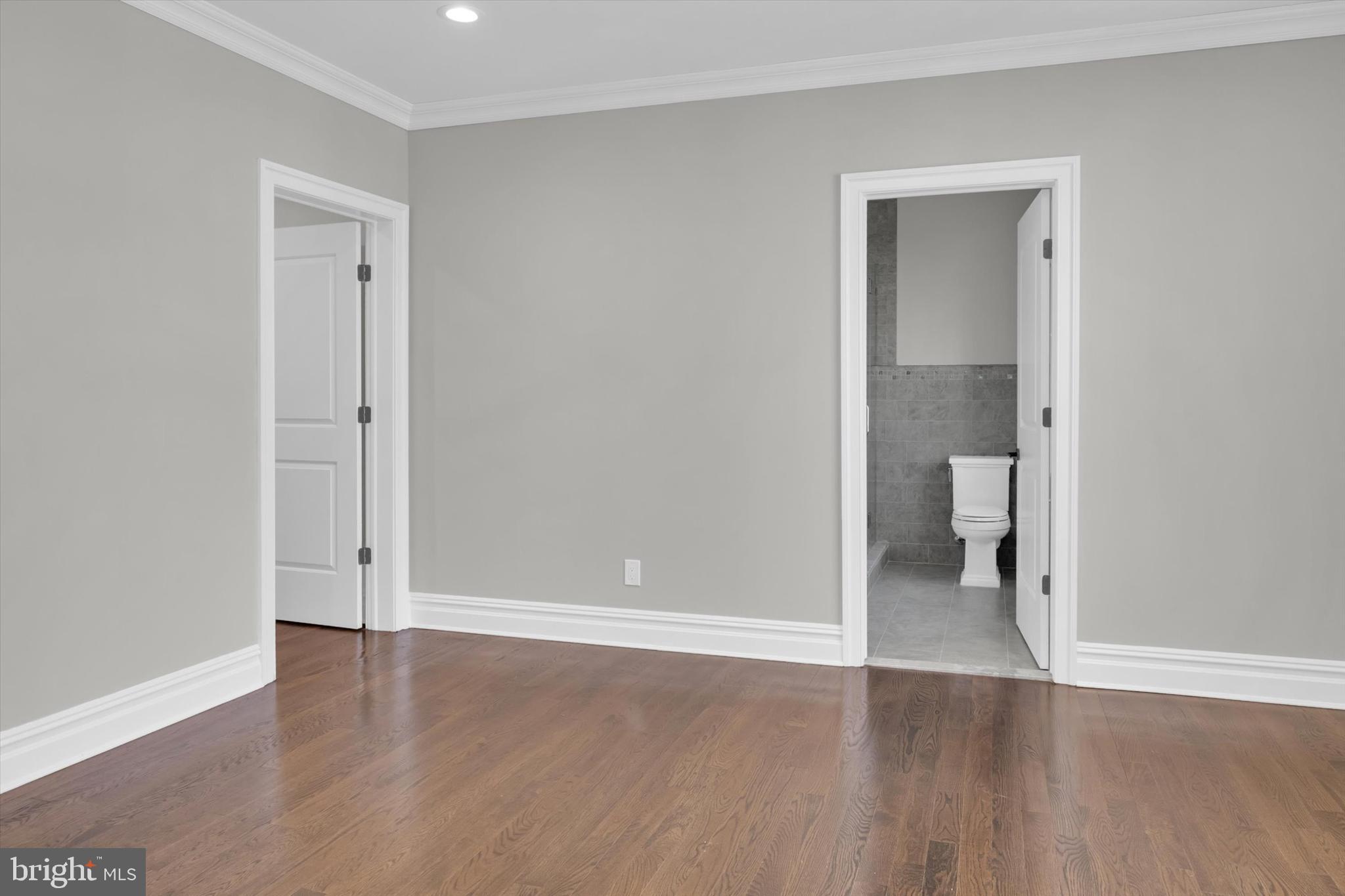 151 Sycamore Road Princeton, NJ 08540 - Photo 32 of 46 an empty room and a gallery with wooden floor