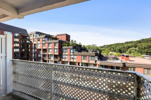 a view of a balcony with city view