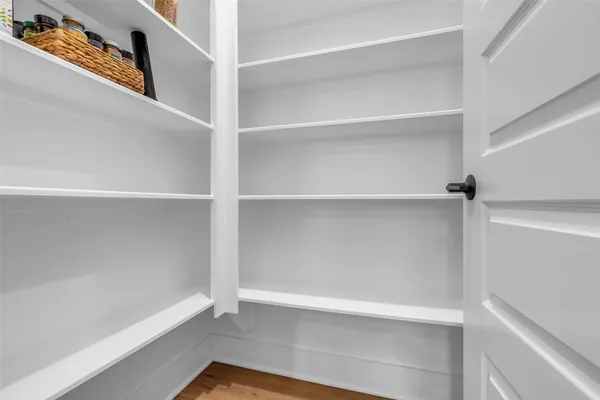 a view of an empty walk in closet