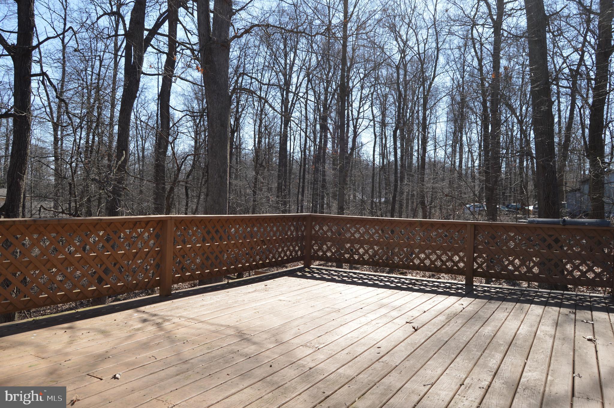 465 Frazier Road Aspers, PA 17304 - Photo 9 of 18 Large back deck in the woods - off the kitchen