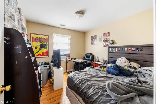 a living room with a couch and a flat screen tv