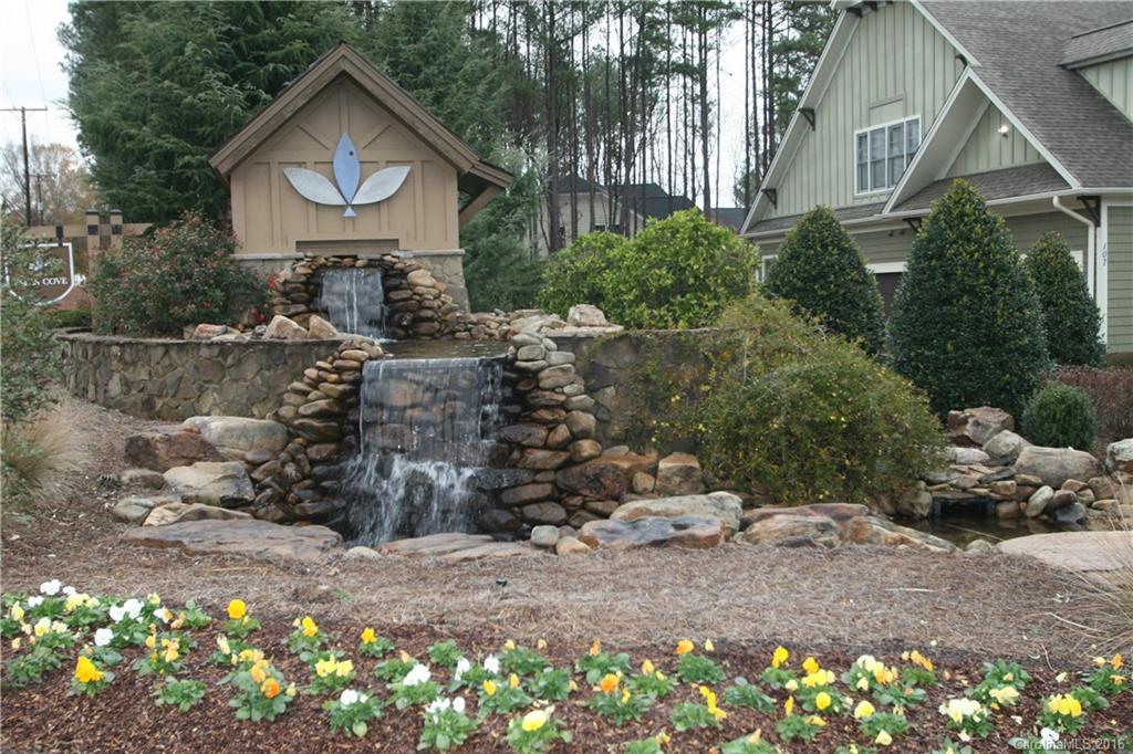 Lot#608 Silver Falls Road Troutman, NC 28166 - Photo 4 of 7 a front view of a house with a yard