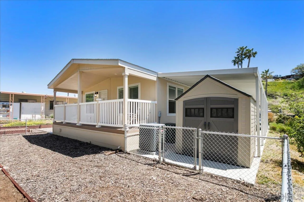 9100 Single Oak Drive Lakeside, CA 92040 - Photo 1 of 28 a front view of a house with a porch