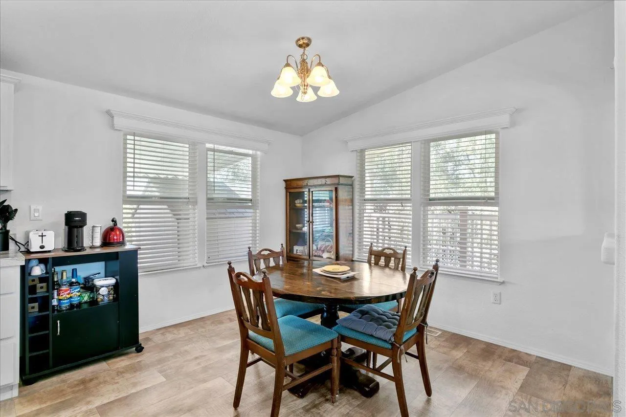 9100 Single Oak Drive Lakeside, CA 92040 - Photo 12 of 28 a dining room with furniture and window