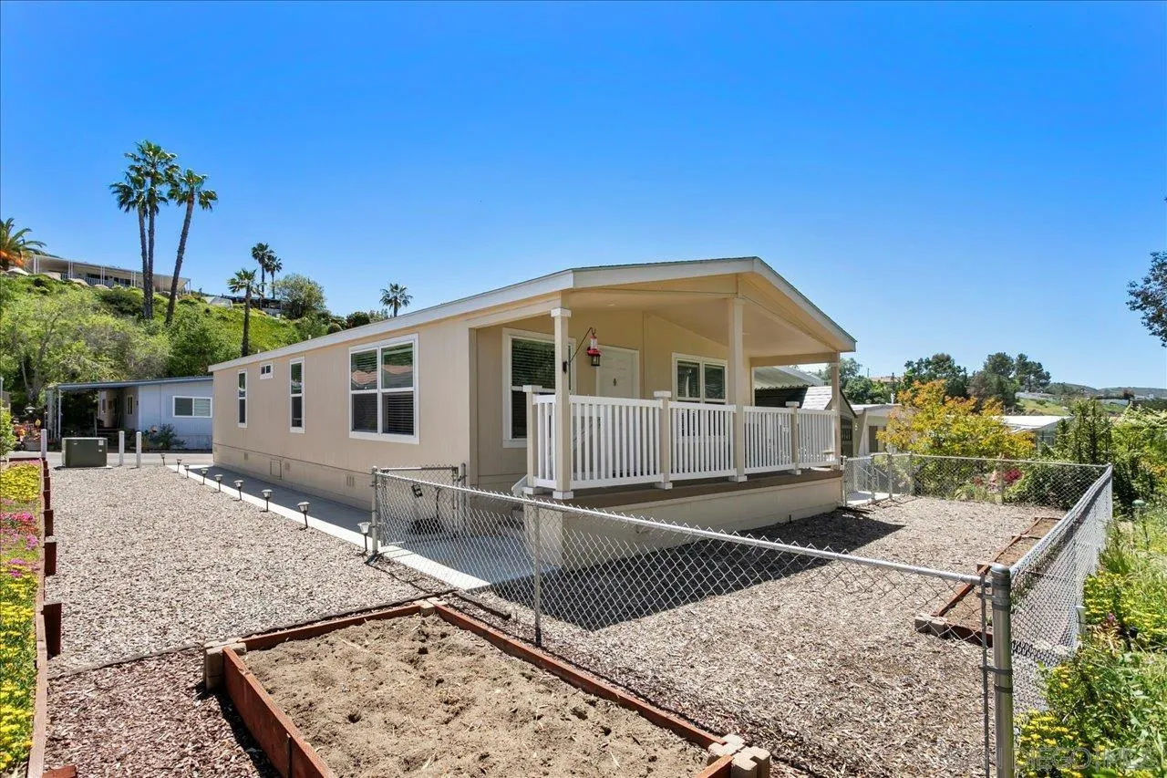 9100 Single Oak Drive Lakeside, CA 92040 - Photo 5 of 28 a view of a house with a patio