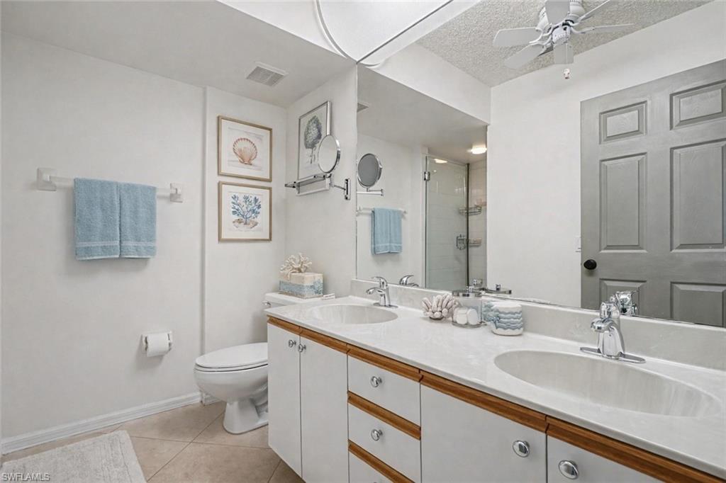 153 Wading Bird Circle, Unit J201 Naples, FL 34110 - Photo 18 of 36 Virtually staged to help visualize the space
