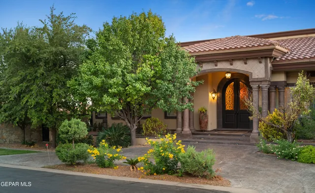 a kitchen with stainless steel appliances granite countertop a stove and a microwave