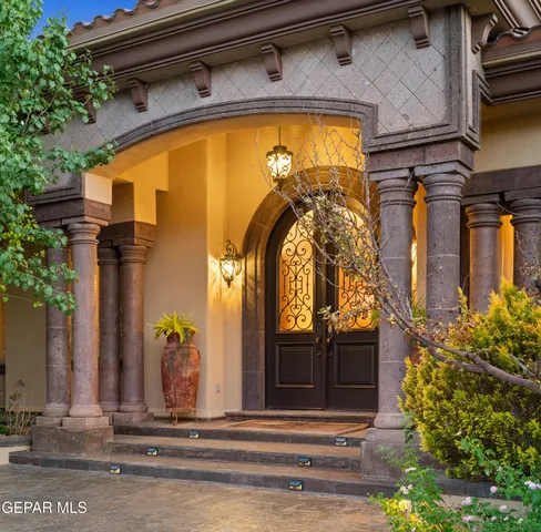 a bathroom with a sink a mirror and a shower