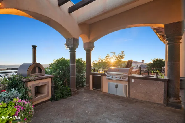 a view of swimming pool from a balcony