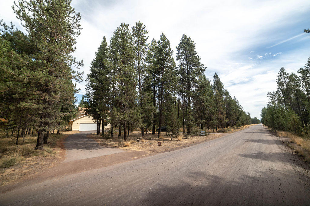 16944 Downey Road Bend, OR 97707 - Photo 34 of 44 a view of road with trees