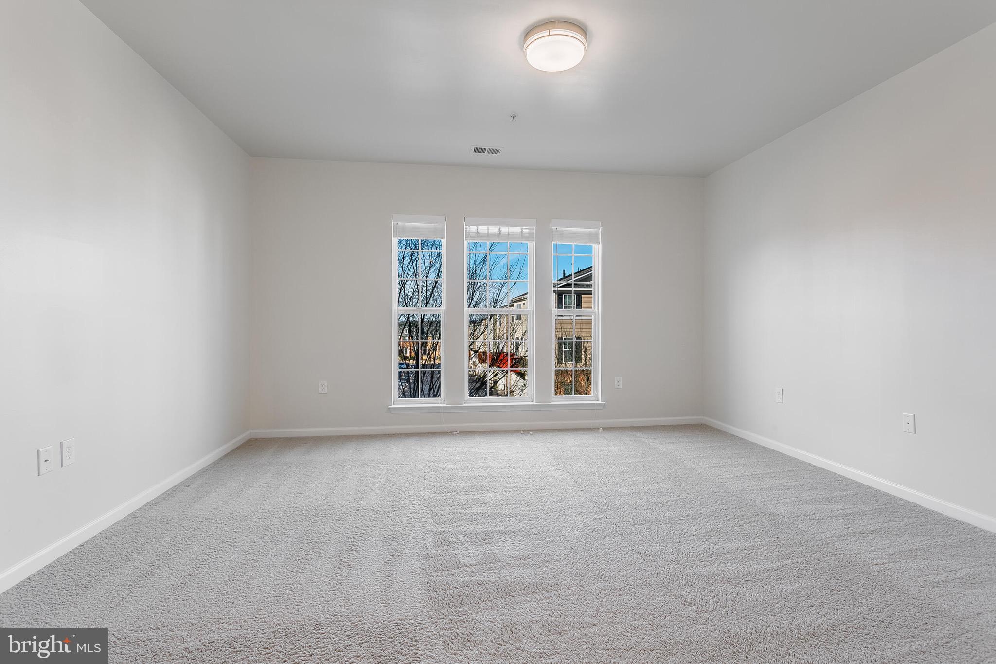20586 Maitland Terrace Ashburn, VA 20147 - Photo 10 of 24 an empty room with windows